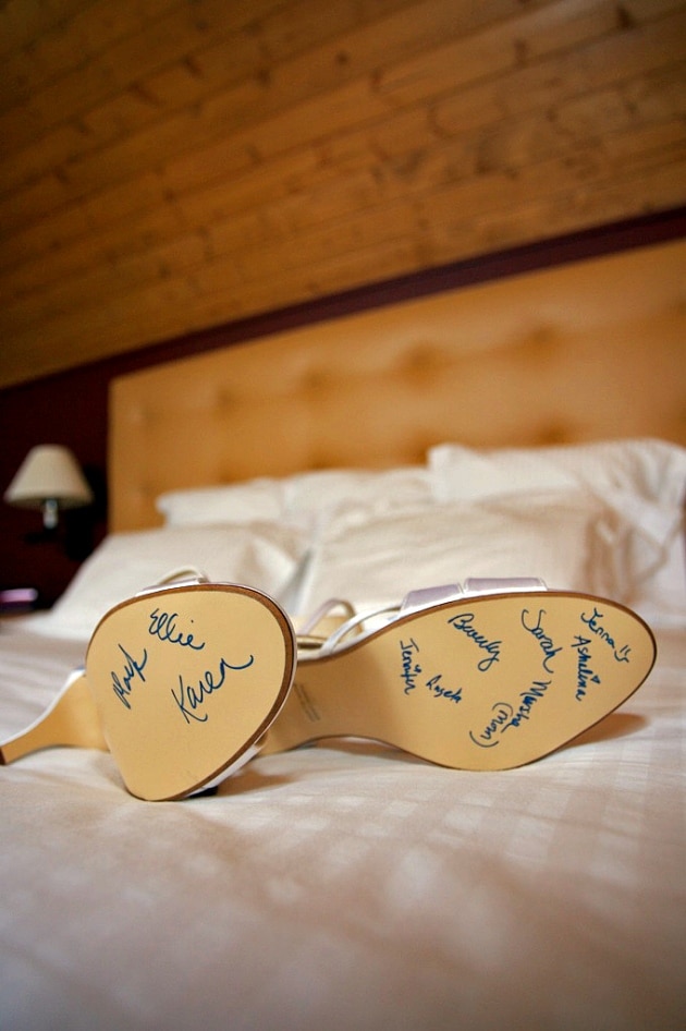 Wedding shoes with names written on them