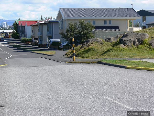 This road in Kópavogur has been narrowed so it doesn't disturb an elf's home