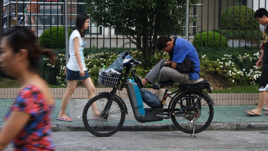 Chinese man texting