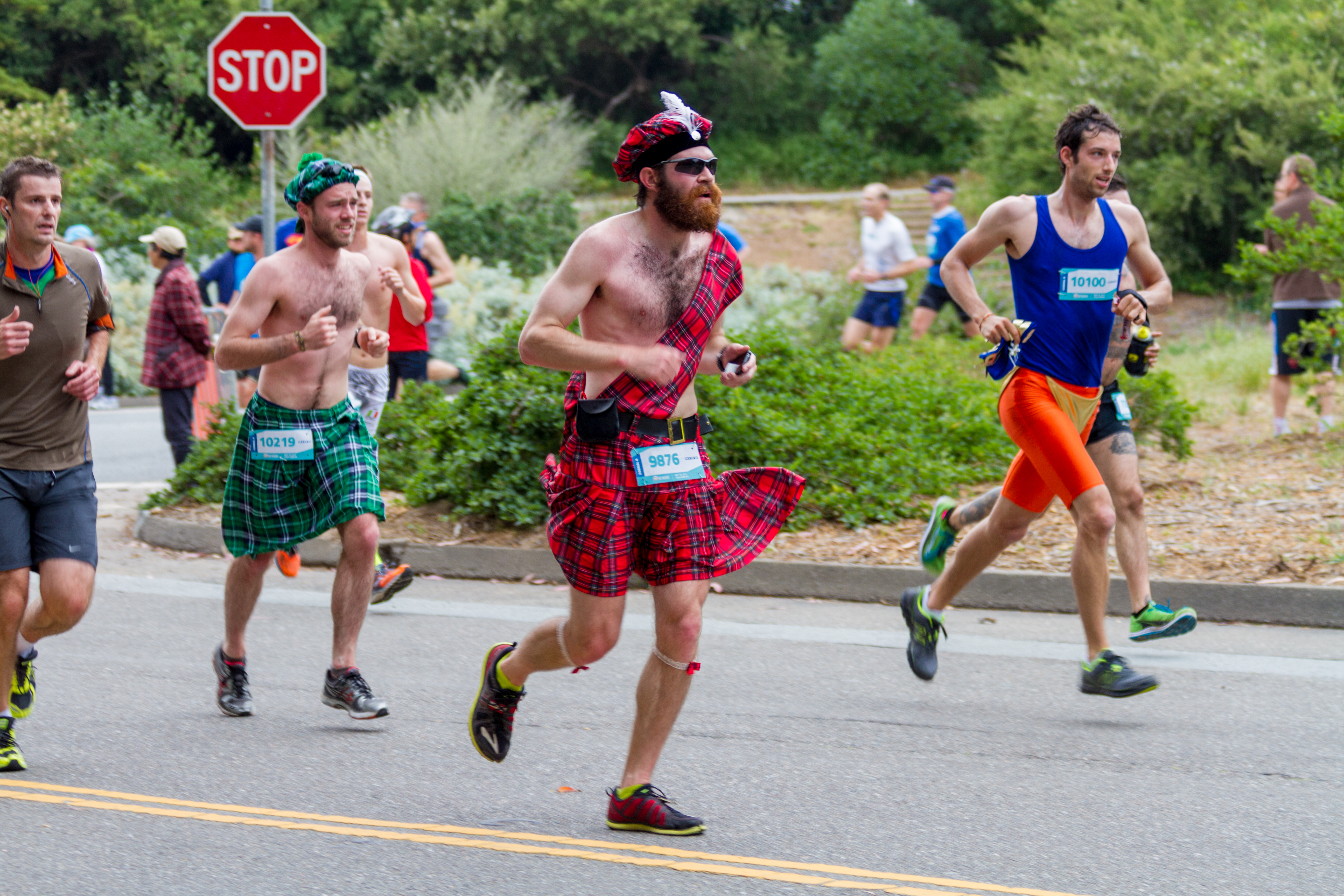 Two kilted runners