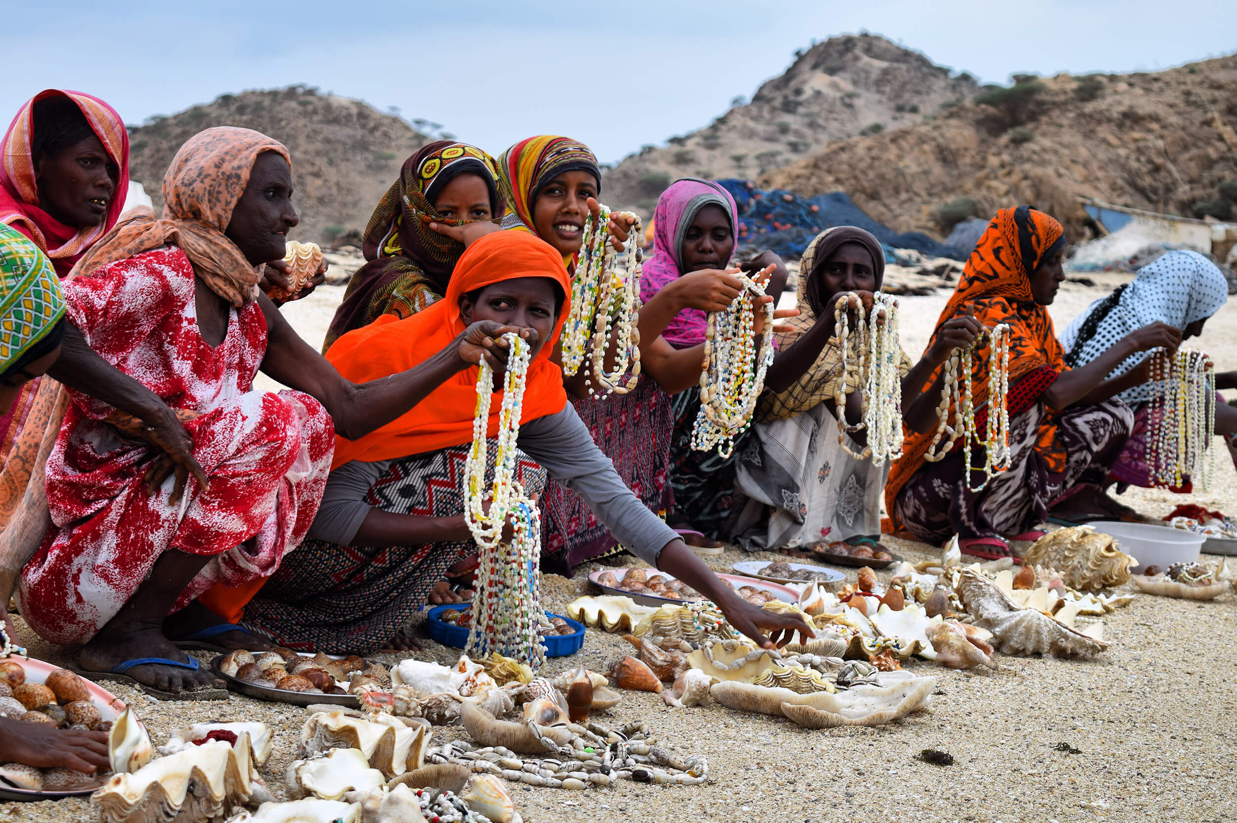 A colourful group of women selling jewellery on some hard-to-reach Eritrean islands