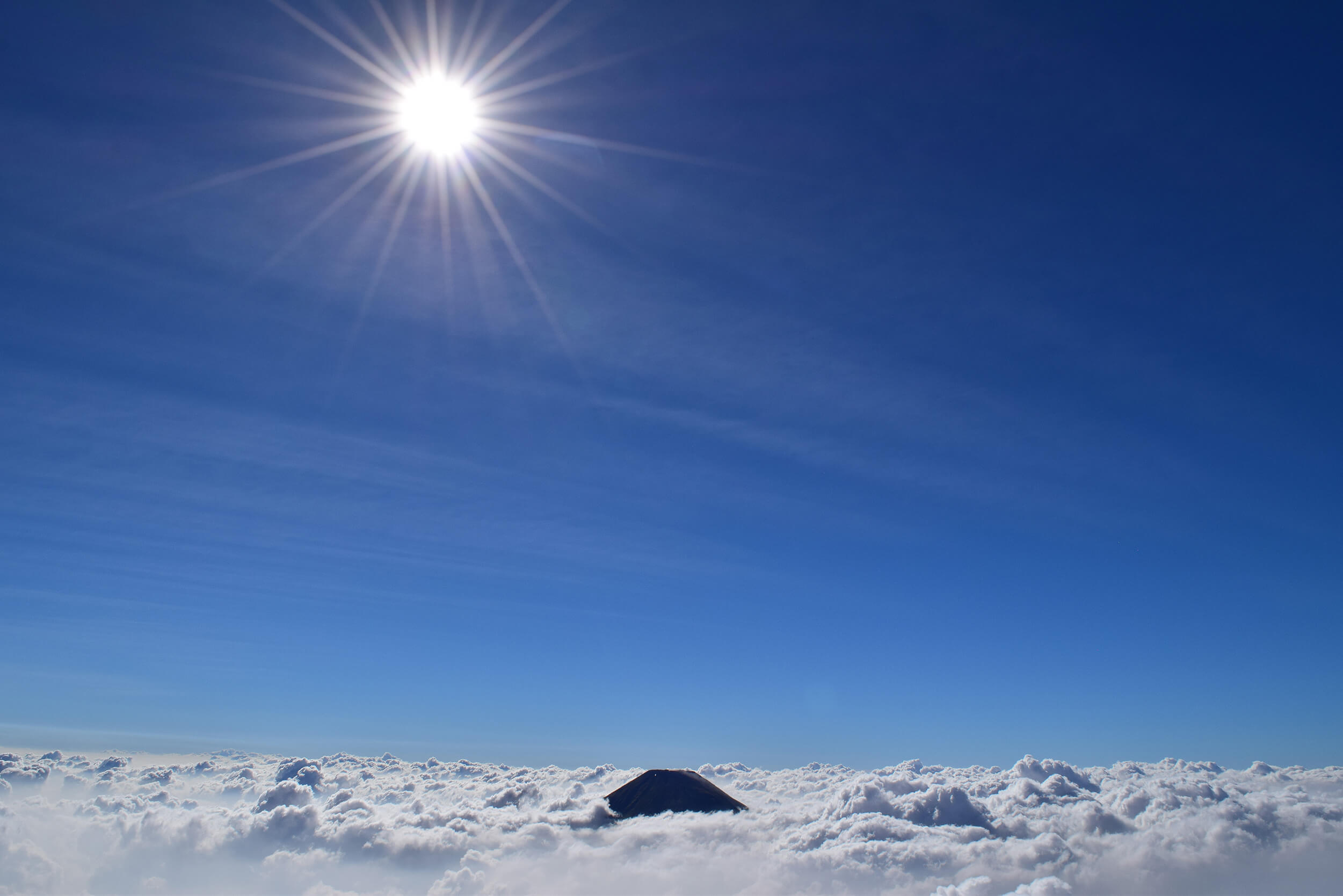Above the clouds on a volcano trek on the island of Java, Indonesia