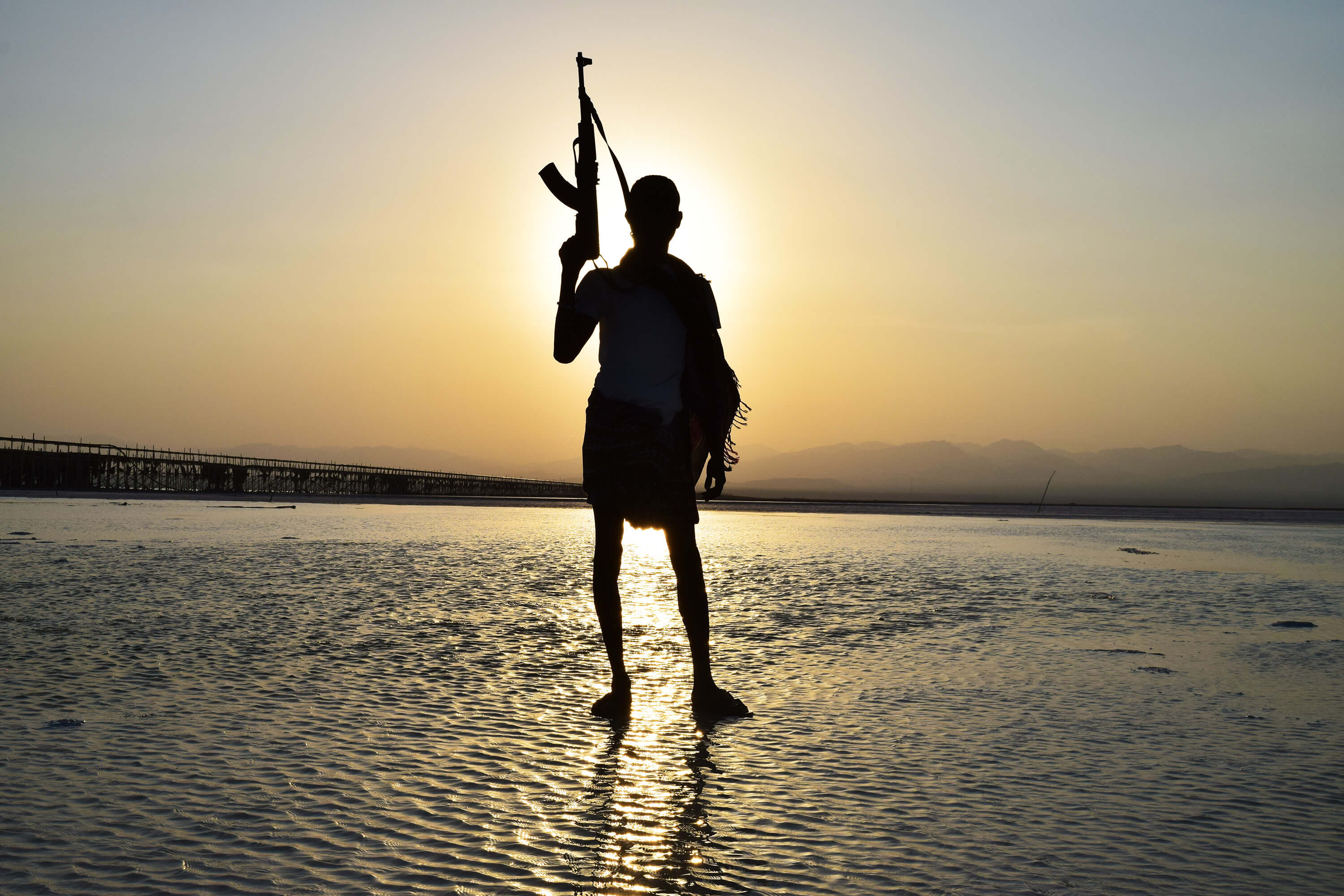 Our Afar guard strikes a pose on the salt flats of the Danakil Depression, Ethiopia