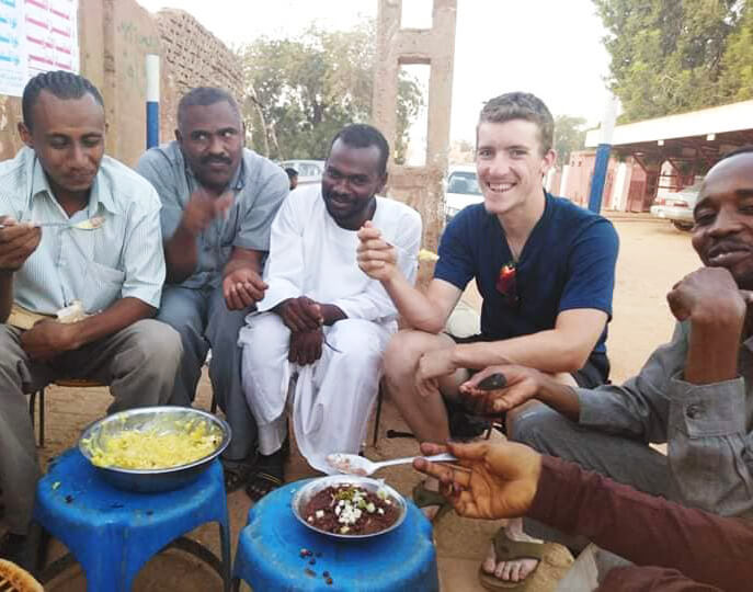 eating with locals in sudan