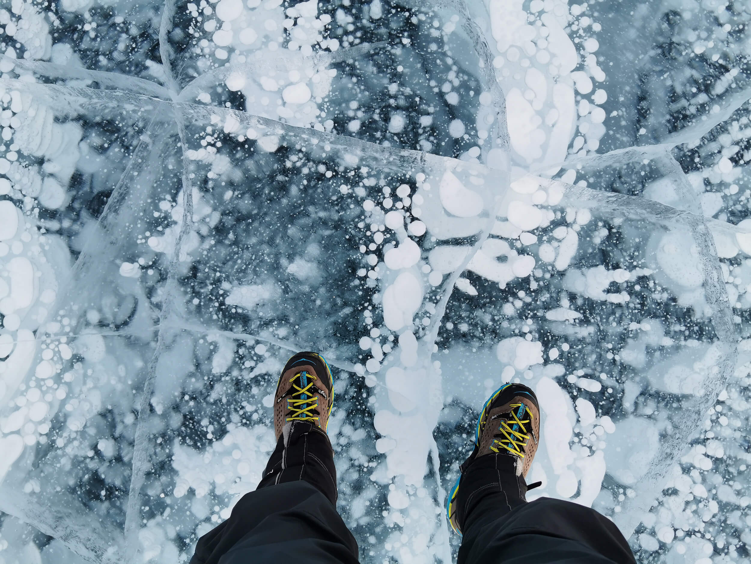 frozen air bubbles encased in ice, Lake Baikal, Siberia_