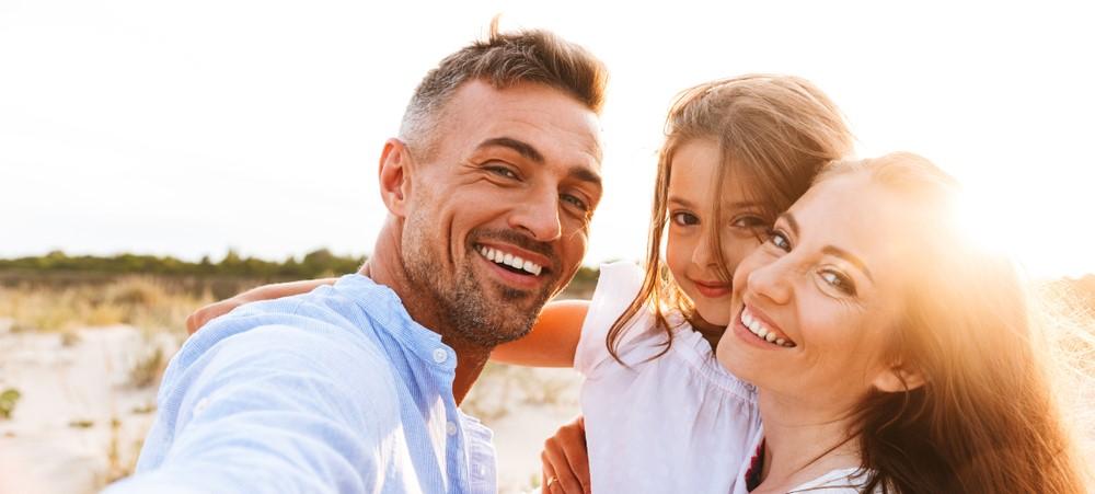 a smiling family on holiday